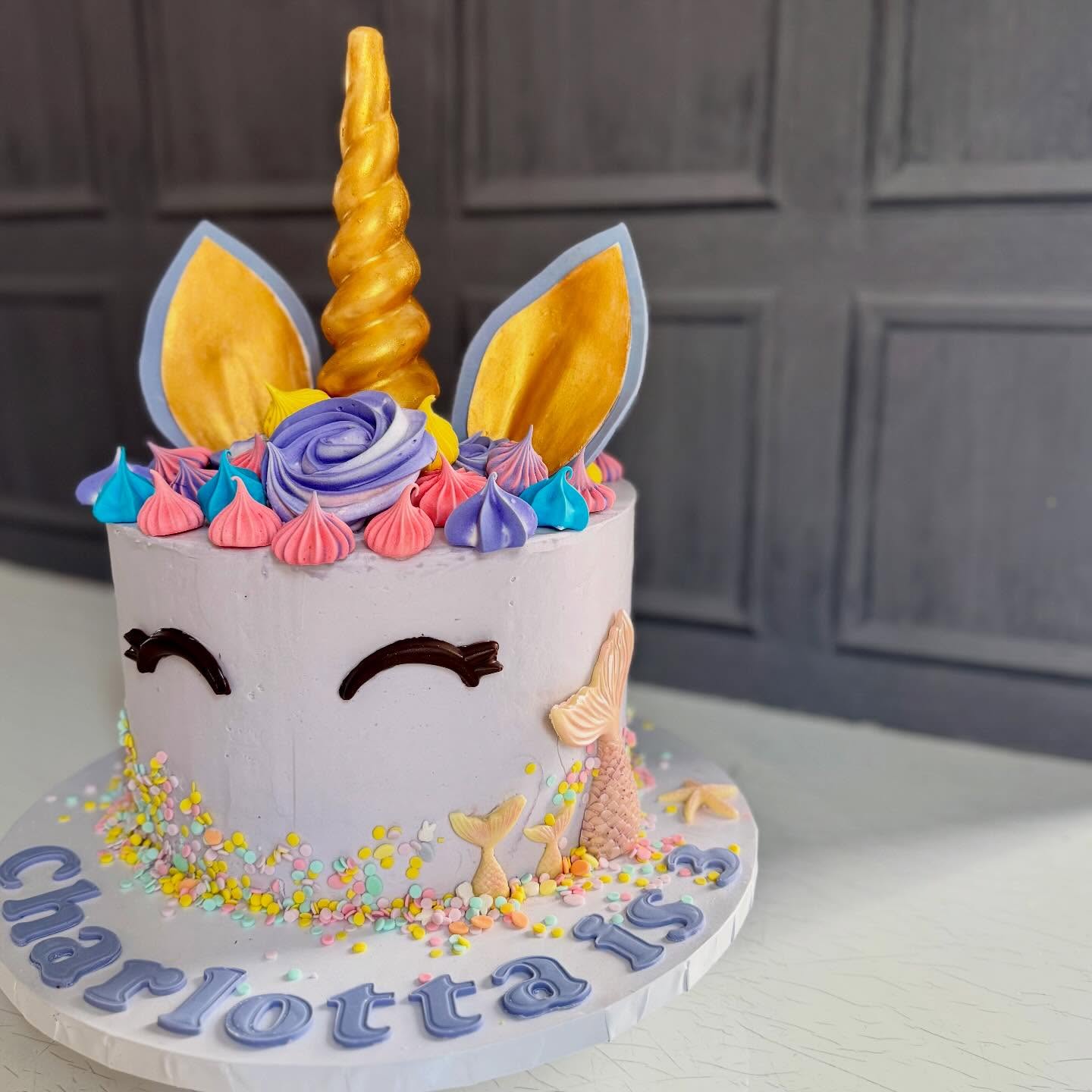 Handcrafted unicorn cake with edible decorations